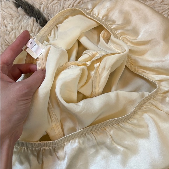 DONNI. Silk Tap Shorts in Light Yellow - Picture 16 of 17